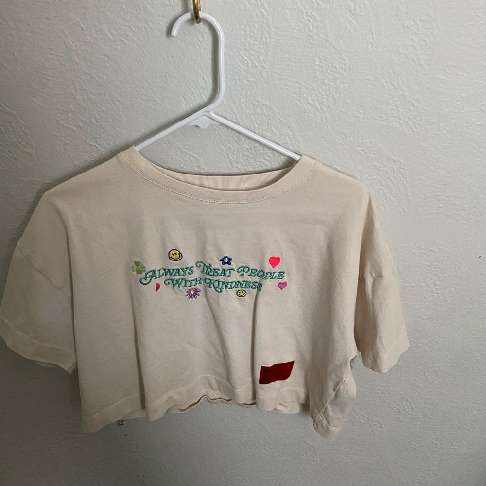 CHNGE cream “always treat people with kindness” crop tee